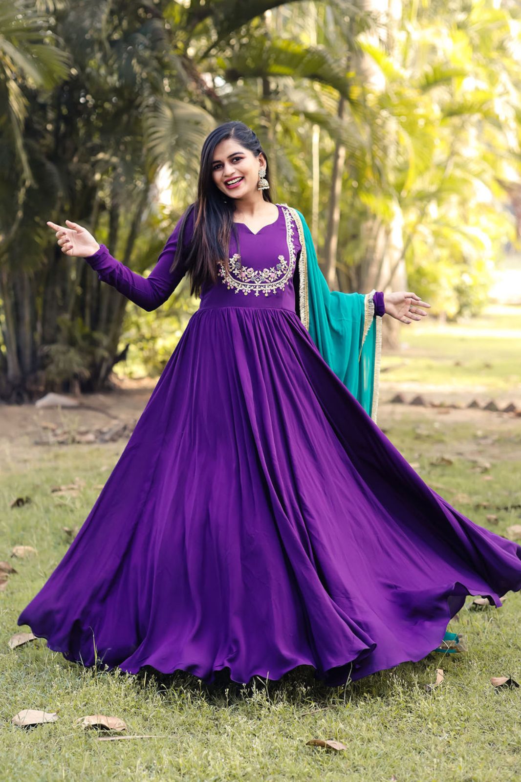 Purple color desinger Gown With Embroidery On Blouse